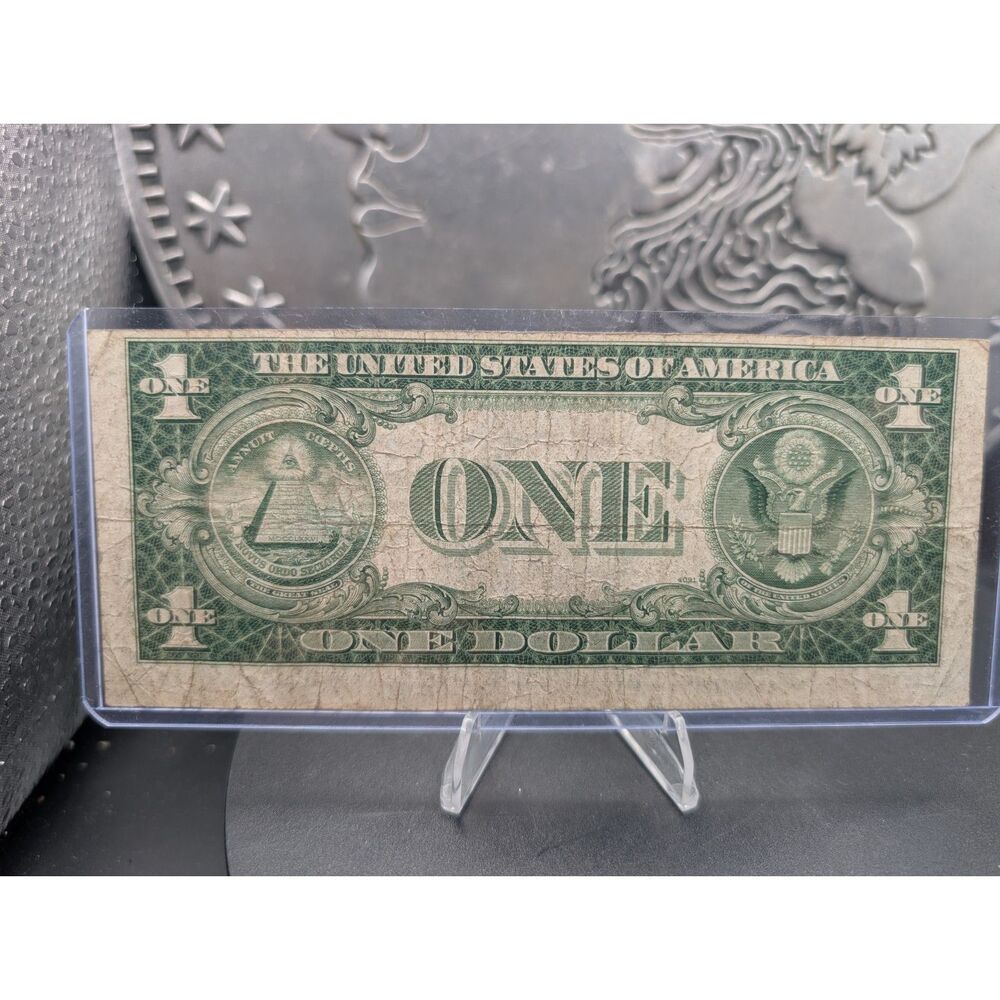 1935C $1 Silver Certificate • Blue Seal • L21179603E • Minor Cut Shift